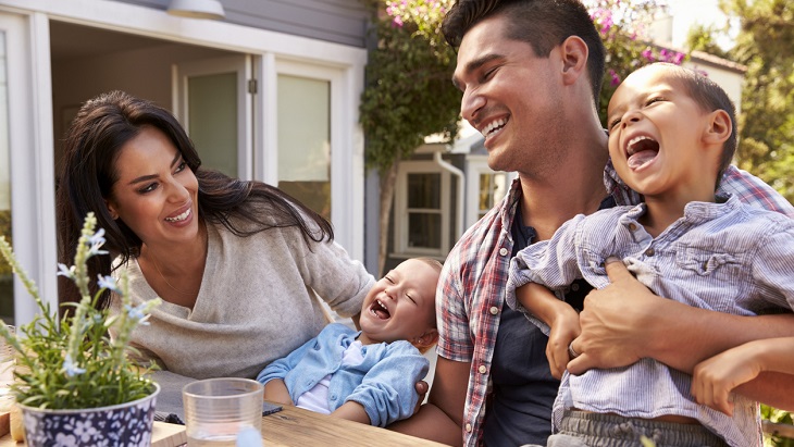 Term Life Insurance – Family laughing together at dinner