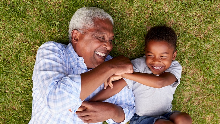 Life Insurance for Seniors – Grandfather playing with grandson